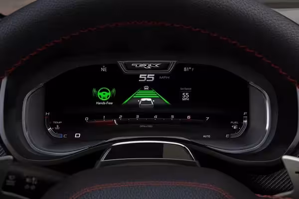 The 14.5-inch Uconnect® touchscreen in the 2027 Ram TRX displaying 'Performance Pages,' showing G-force measurements, vehicle dynamics (pitch and roll angles), and other performance data.