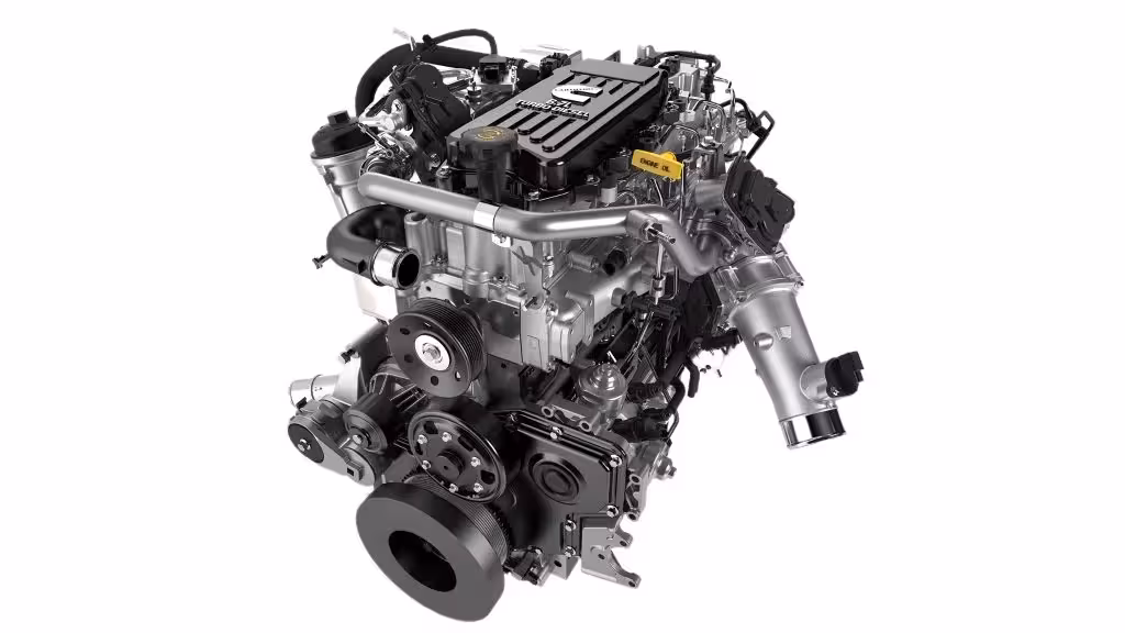 Detailed image of a 6.7-liter CUMMINS turbodiesel I6 engine, showcasing its various metallic components, belts, pulleys, and the 'CUMMINS TURBO DIESEL' branding on the valve cover.
