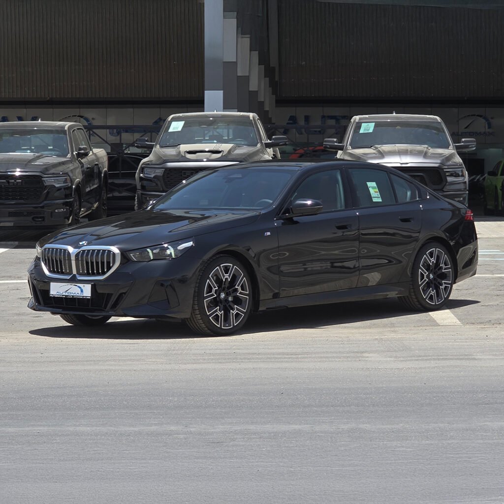 2025 BMW 520i M Black Sapphire Carbon Fiber