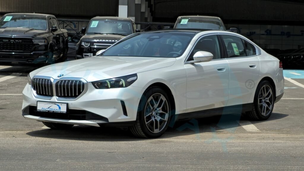 BMW 520i 2025 Mineral White Red Page 1