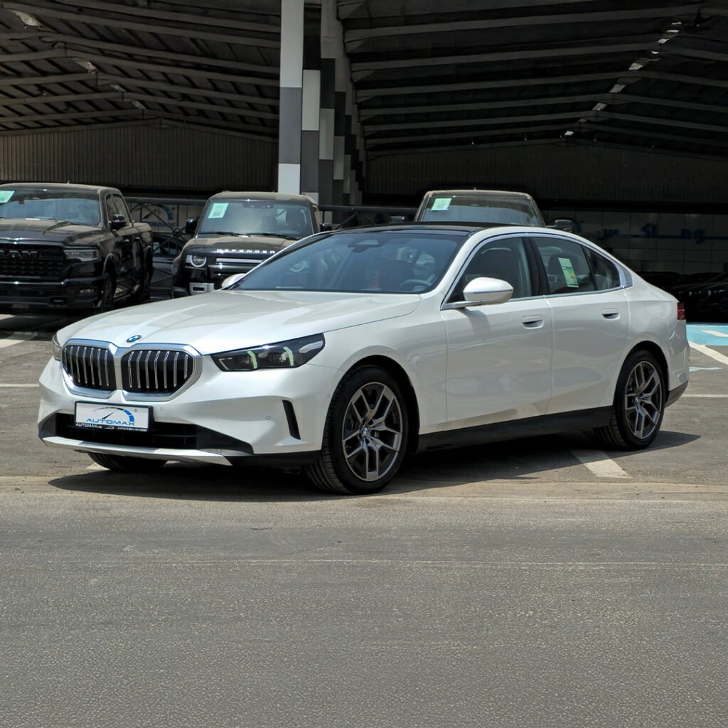 2025 BMW 520i Mineral White Red