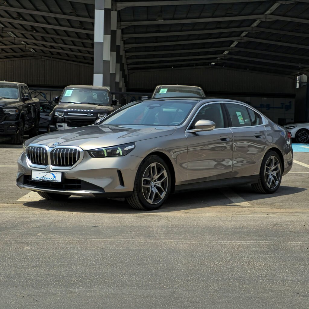 2025 BMW 520i Oxide Grey Red