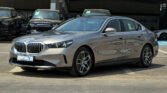 2025 BMW 520i Oxide Grey Red