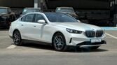 BMW 520i 2025 Mineral White Red Page 3