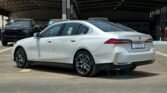 BMW 520i 2025 Mineral White Red Page 4