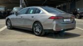 BMW 520i 2025 Oxide Grey Red Page 4