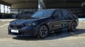 BMW 520i M 2026 Carbon Black Brown Page 1