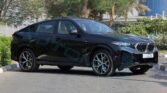 BMW X6 xDrive 40i M 2026 Black Sapphire Tan Page 4