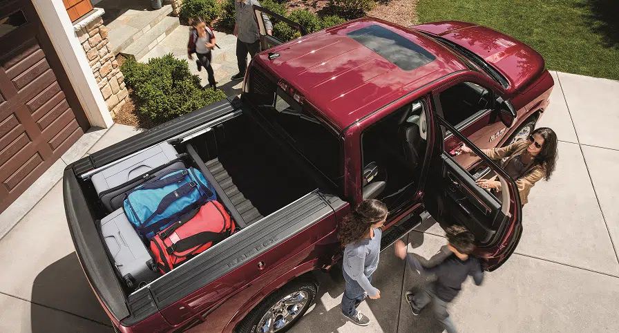 Ram 1500 Laramie Delmonico Red Pearl with Family3560